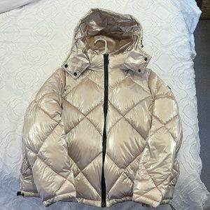 Pink silver jacket. New without ticket. The hood can be removed